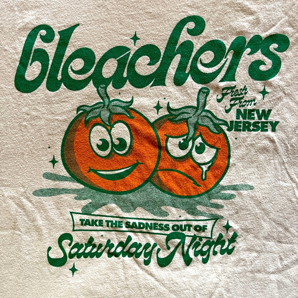 BLEACHERS band t-shirt without a tag. I’d guess it’s an XL.